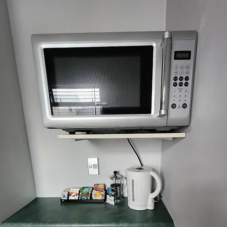 Aquarius Motor Inn Mount Maunganui Room photo